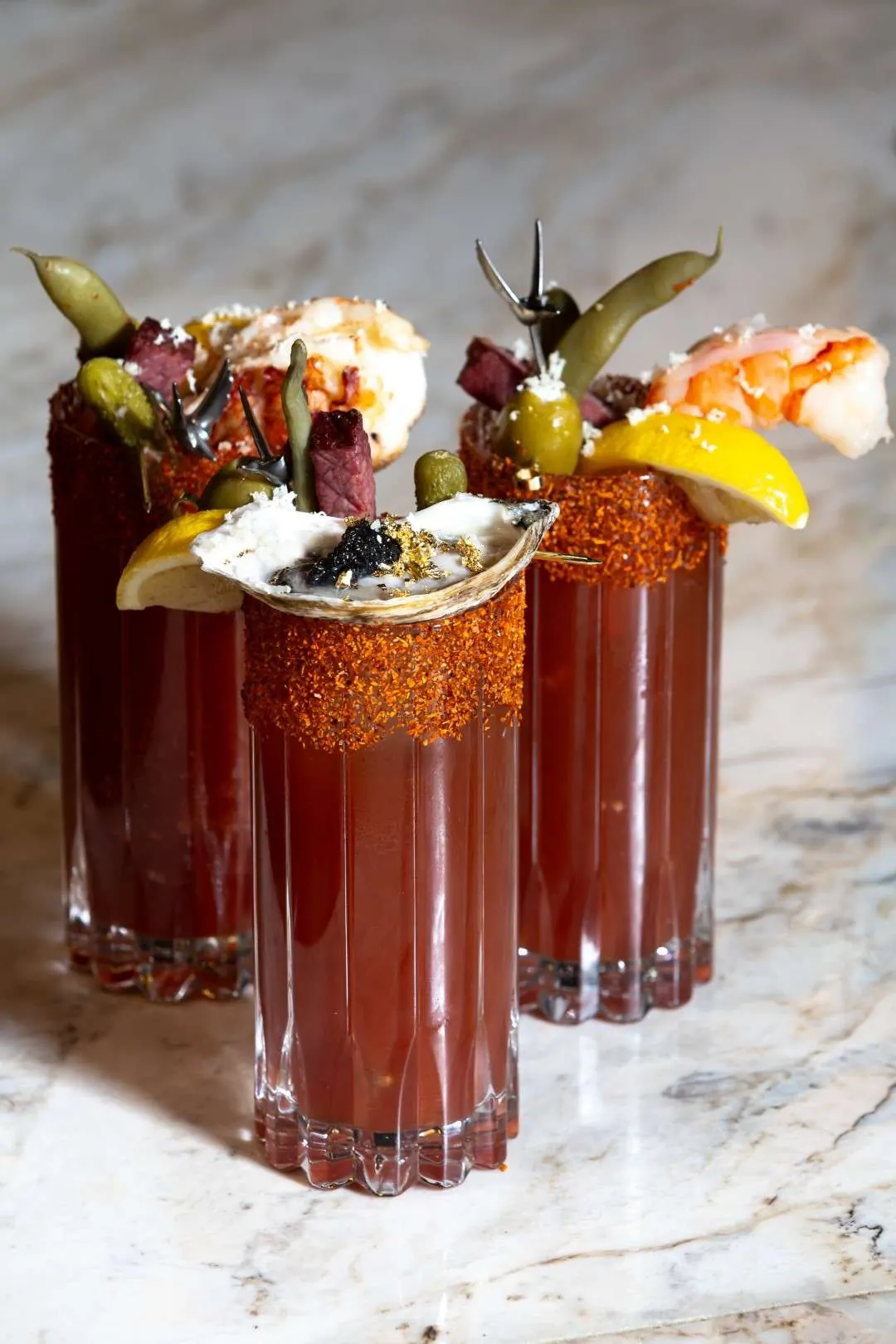Le Prestige Caesars topped with lobster, shrimp and oysters